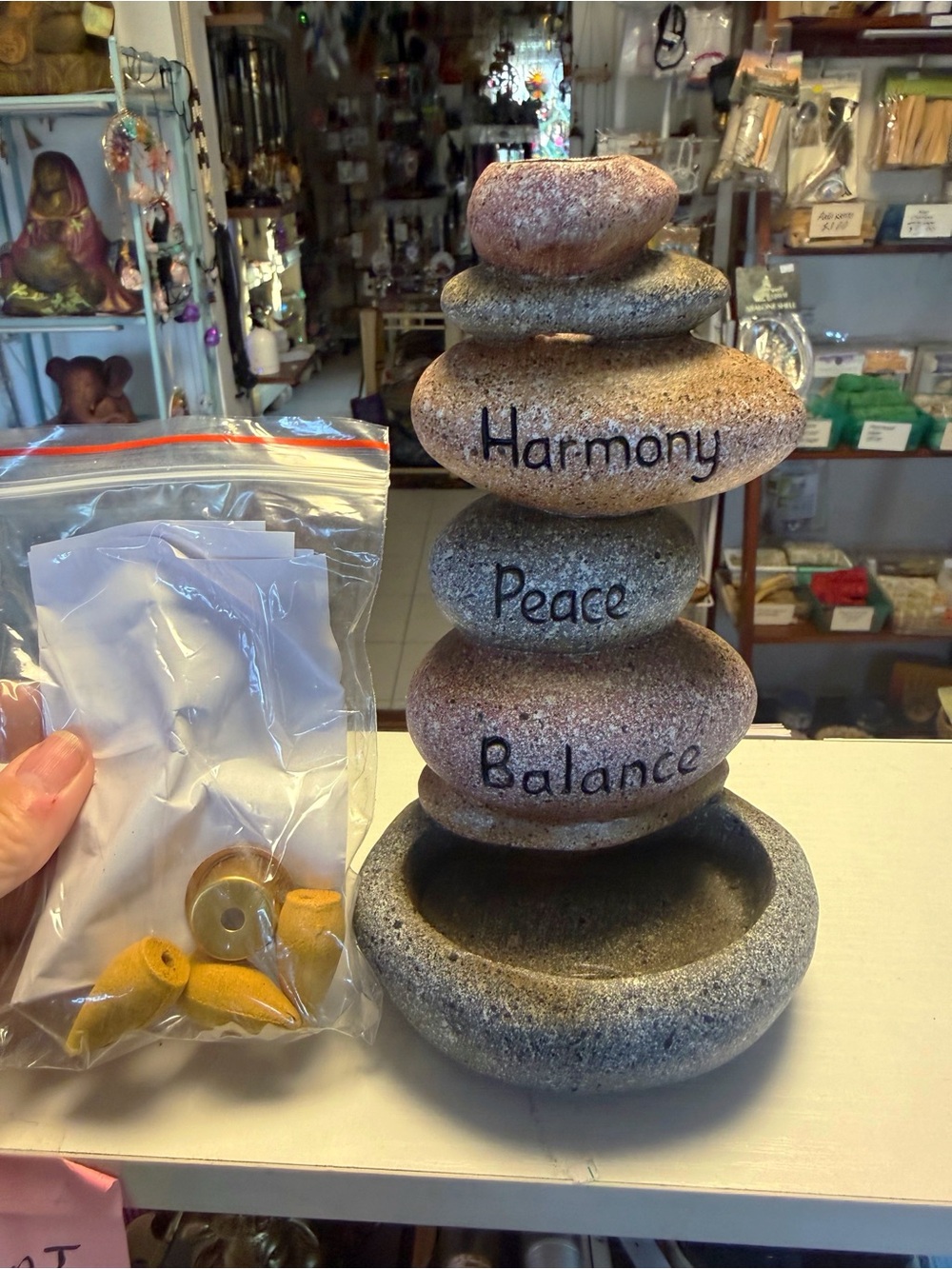 Inspirational stones back flow burner